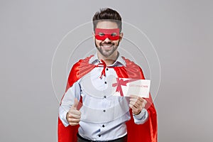 Smiling powerful business man in shirt superhero suit have supernatural abilities isolated on grey background