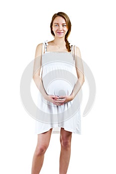 Smiling pregnant woman - isolated over a white background