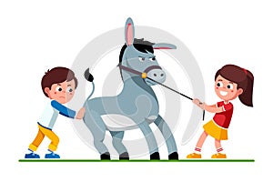 Girl pulling donkey on reins and boy pushing it photo