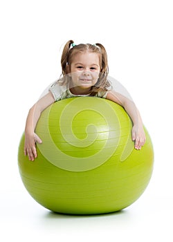 Smiling pretty kid with fitness ball. Isolated on white background.