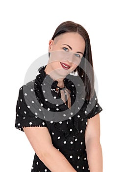Smiling pretty woman in a pock dot dress