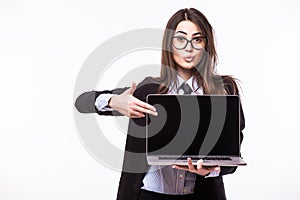 Smiling pretty young woman with friendly happy smile holding a laptop computer