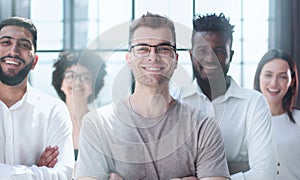 Smiling professional business leaders and employees group team portrait