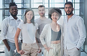 Smiling professional business leaders and employees group team portrait