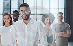 Smiling professional business leaders and employees group team portrait