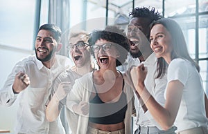 Smiling professional business leaders and employees group team portrait