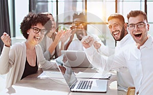 Smiling professional business leaders and employees group team portrait