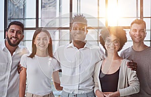 Smiling professional business leaders and employees group team portrait