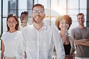 Smiling professional business leaders and employees group team portrait