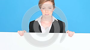 Smiling Professional Holding Blank Sign
