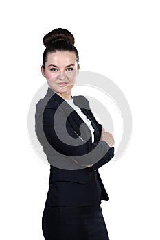 Smiling professional lady standing sideways with arms crossed