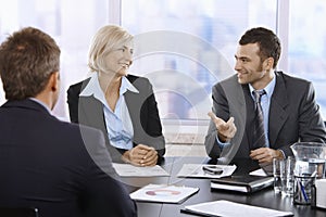 Smiling professionals in office