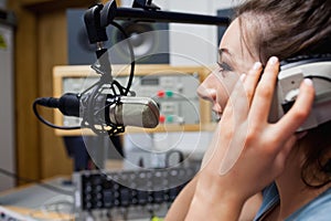 Smiling radio host speaking