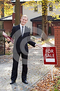 Smiling real estate broker