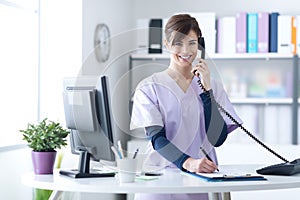 Smiling receptionist at the clinic