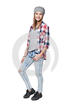 Smiling relaxed teen girl standing in full length