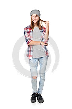 Smiling relaxed teen girl standing in full length