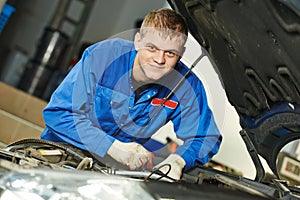 Smiling repairman auto mechanic