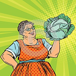 Smiling retro old woman with a head of green cabbage