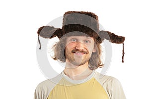 Smiling Russian man in cap with ear-fl