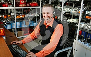 Smiling Salesman Auto Parts Store
