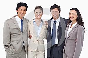 Smiling salespeople standing together photo