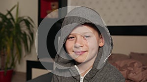 Smiling school boy, headshot of a teenage lad, cute youth, happy child portrait