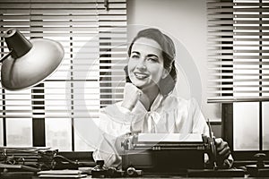 Smiling secretary at work photo