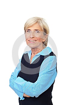 Smiling senior with arms folded
