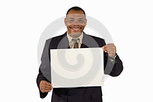 Smiling senior businessman presenting a board