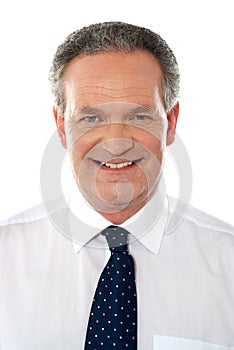 Smiling senior corporate man. Closeup