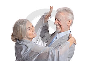 Smiling senior couple dancing