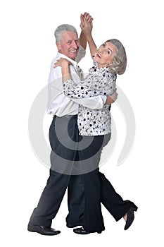 Smiling senior couple dancing