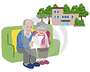 Smiling Senior couple looking at paper with retirement home in background