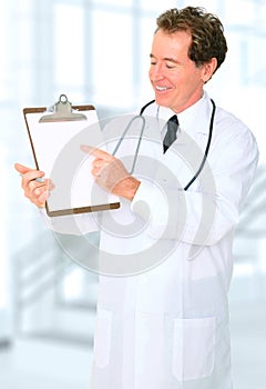 Smiling Senior Doctor Showing Blank Board