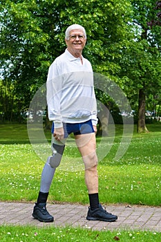 Smiling senior man with false leg