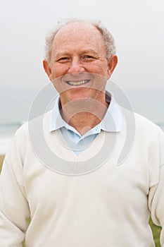 Smiling senior man posing at outdoor