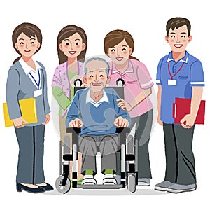 Smiling Senior man in wheelchair and nursing carers