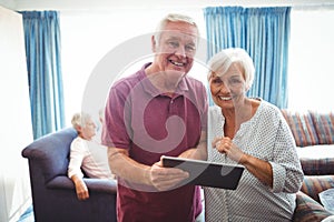 Smiling senior people looking at the camera