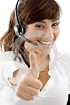 Smiling service provider with thumbs up