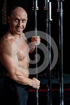 Smiling Shirtless Man Taking Barbell Bar, Going To Train In Gym, Portrait, Posing