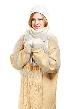 Smiling shy woman in warm clothing