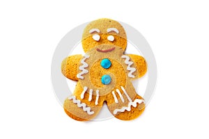 Smiling single gingerbread man christmas cookie isolated at white background