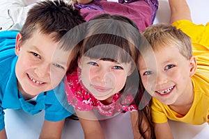 Smiling sister with brothers