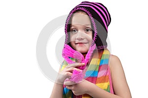 Smiling six year old girl in a colorful scarf