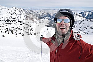 Smiling skier in ski paradise