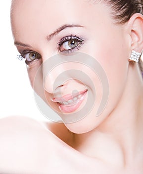 Smiling skittish young woman photo