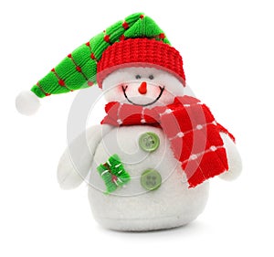 Smiling snowman toy dressed in scarf and cap