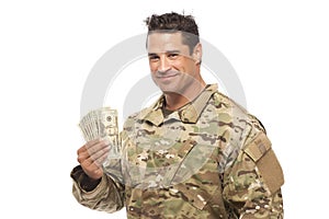 Smiling soldier holding money
