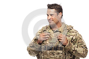 Smiling soldier looking away